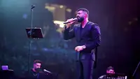 النجم سيف نبيل يحي حفل في قطر مول بحضور جمهور استثنائي